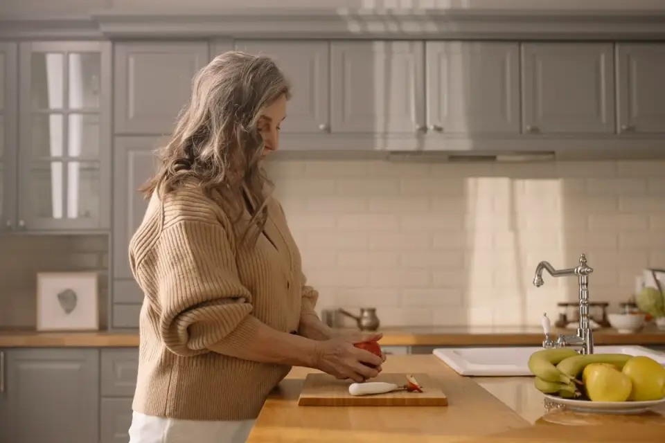 Dog owner preparing a meal